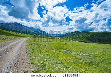 Extreme Rocky Road In A Mountain Valley To The Pass In Cloudy Weather With Rain And Fog Plateau Ukok