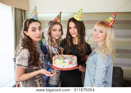 Birthday. Girls Posing With Cake On Birthday