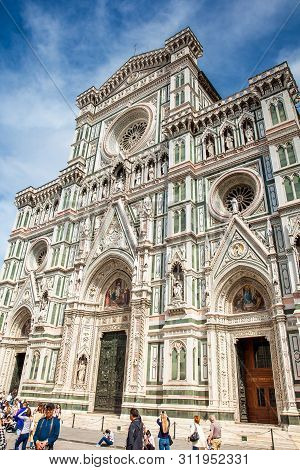 Florence, Italy - April, 2018: Tourists At The Beautiful Florence Cathedral Consecrated In 1436