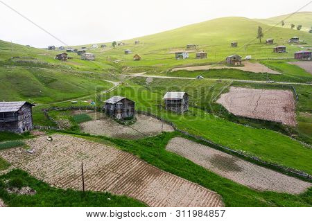 Beautiful Nature With Country Cottages And Traditional Wooden Houses On The Road Through The Goderdz