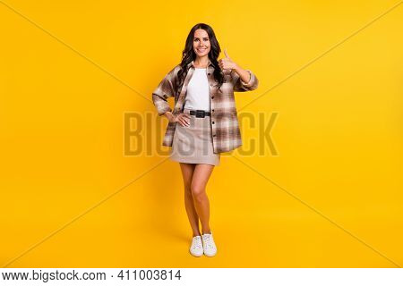 Photo Of Adviser Lady Raise Thumb-up Wear Checkered Jacket Short Skirt Footwear Isolated Yellow Colo