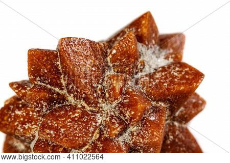 Macro Mineral Stone Ikaite On A White Background