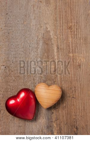 Two hearts on wood
