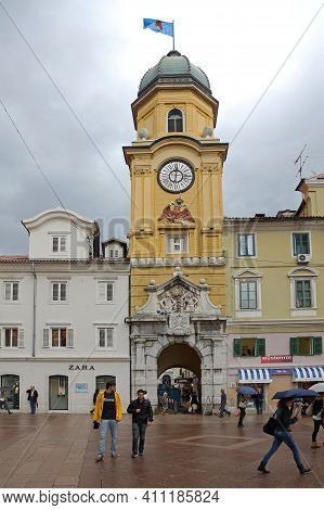 Rijeka, Croatia - October 17, 2014: Clock Tower And City Gate Landmark At Korzo Street In Downtown R