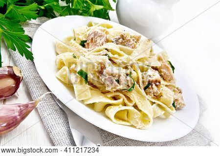 Pasta With Salmon And Cream On Light Board