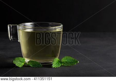Glass Cup Of Melissa Herbal Tea With Fresh Melissa Leaf, Organic Aromatherapy Relaxation Hot Drink C