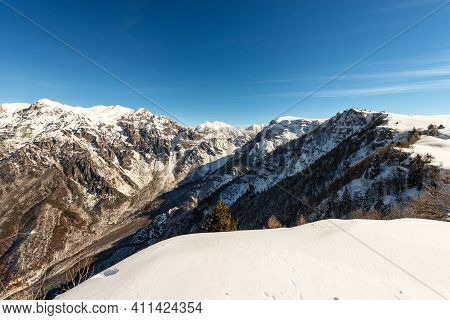 Mountain Range Of The Monte Carega In Winter With Snow, Called The Small Dolomites (piccole Dolomiti