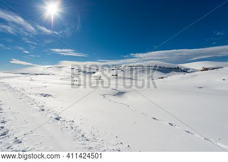 Lessinia High Plateau (altopiano Della Lessinia) And The Tomb Mountain (monte Tomba) In Winter With 