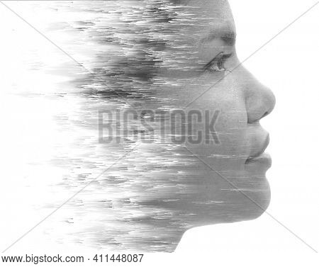 A black and white portrait of a young aisan woman with visual distortion