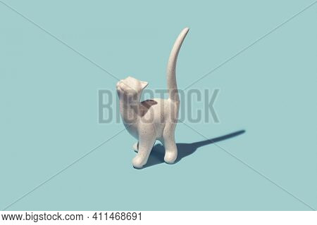 Porcelain cat figurine with long tail 