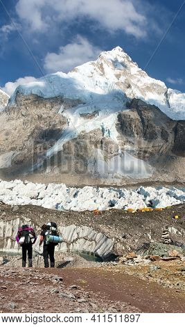 Mount Nuptse, Mount Everest Base Camp And Two Toutists, Khumbu Glacier, Sagarmatha National Park, Ne