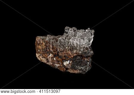 Macro Hyalite Mineral Stone On A Black Background