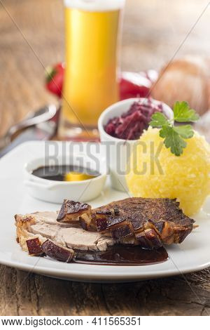 Overview Of A Bavarian Roasted Pork With Potato Dumpling