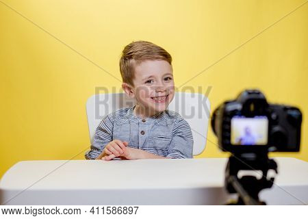 Child Blogger Videotapes His Vlog At Home. Boy Recording His Video Blog. Little Vlogger Makes Online
