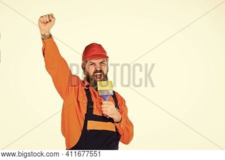 Talented Master. Priming Entire Wall. Decoration And Decor. Painting Walls. Bearded Mature Man Paint