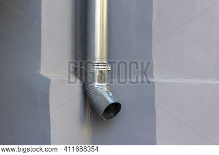 Aluminum Gutter Box Water Collector Box For Roof Drainage. Sink Rainwater Drainage. Selective Focus.