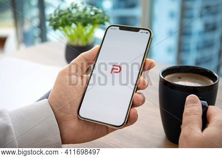 Alanya, Turkey - January 12, 2020: Man Hand Holding Iphone 12 Pro Max Gold With Social Networking Se