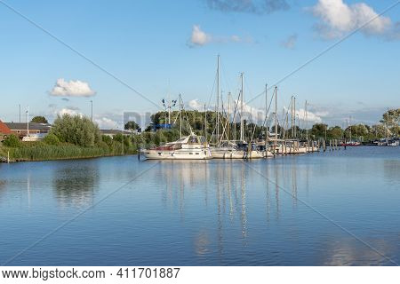 Landscape With Sailing Yachts On The River Harle In Harlesiel
