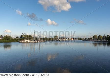 Landscape With Sailing Yachts On The River Harle In Harlesiel