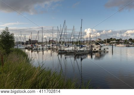 Landscape With Sailing Yachts On The River Harle In Harlesiel