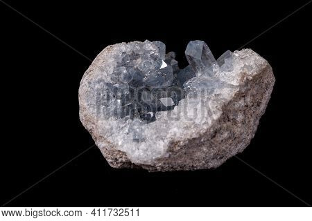 Celestine Mineral Stone Macro On Microcline On Black Background