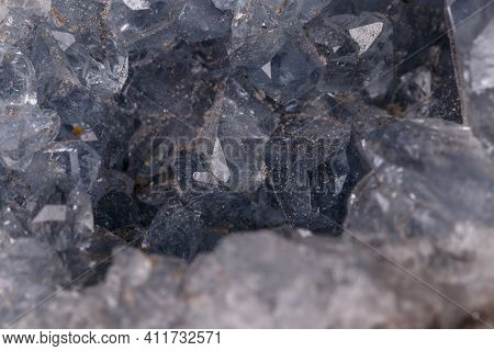 Celestine Mineral Stone Macro On Microcline On Black Background