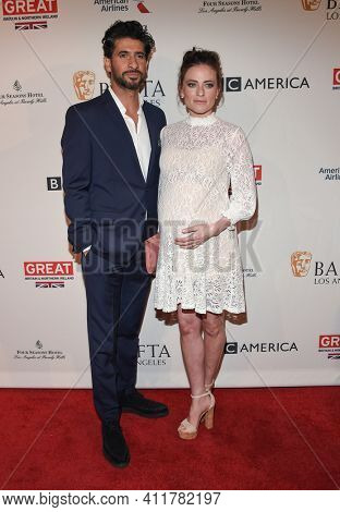 LOS ANGELES - JAN 7:  Raza Jaffrey and Lara Pulver arrives for  BAFTA Los Angeles Tea Party 2017 on January 07, 2017 in Beverly Hills, CA