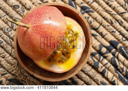 Ripe Organic Passion Fruit On Dark Background. Above View