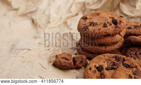 Flatview Of Handcrafted Chocolate Cookies With Chocolate Chips On Baking Paper