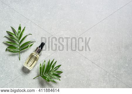 Hyaluronic Acid, Botulin, Face Serum In Vial At Stone Table. Flat Lay Image With Copy Space.