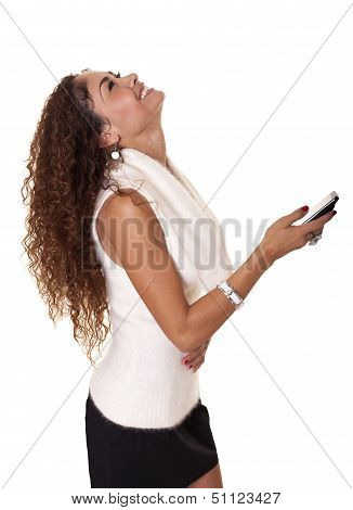Beautiful Woman Laughs At Her Cell Phone.
