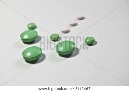 Groen en roze pillen