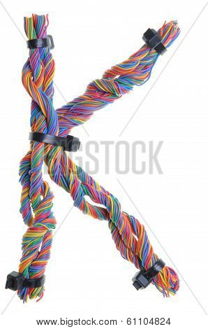 Colorful wire in the shape of the letter K