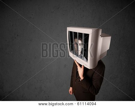 Business man with monitor screen on his head traped into a digital system concept