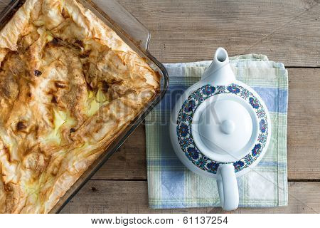 Oven Dish With Plain Turkish Borek And A Teapot