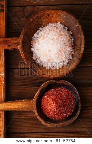 Himalayan Pink Crystal Rock salt and Hawaiian Red Alaea Sea Salt in rustic wooden spoons