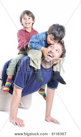 Happy Young Father With His Children On White Background
