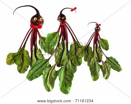 Funny portraits of men and women, made ??from beets