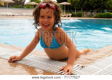 Little girl in the pool.