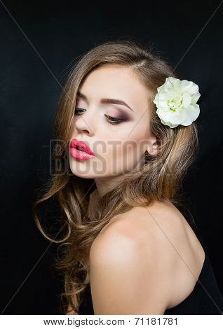 portrait of a girl with red lips flower head