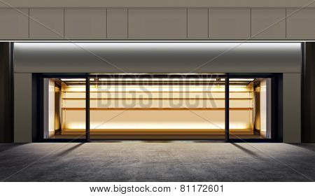 small empty shop on the city street at night