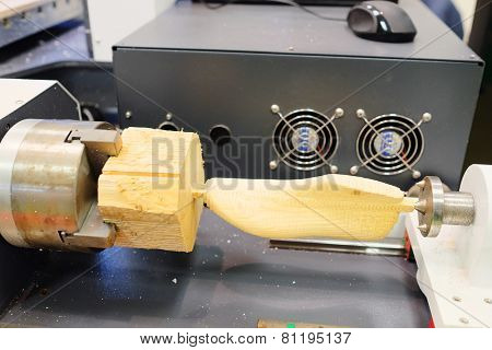 manufacture of wooden prosthesis isolated under the white background