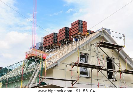 Housetop Of New Building Will Be Roofed