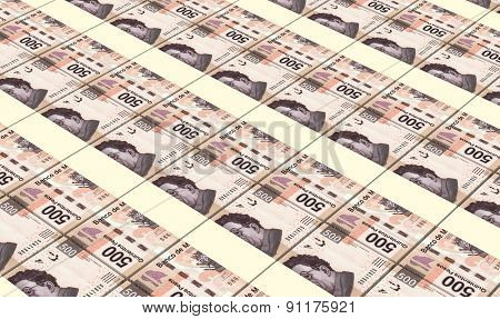 Mexican pesos bills stacks background.