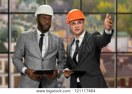 Two construction managers' daytime meeting.