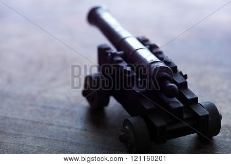 War or conflict concept image. Extremely shallow depth of field. Low key.
