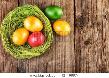 Easter eggs decoration on old wood