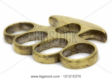 Brass knuckle-duster, weapon for hand, isolated on white background