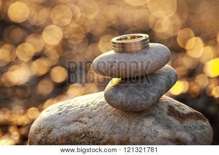 Beautiful wedding rings on a beach, taken in Rhodes island, Greece
