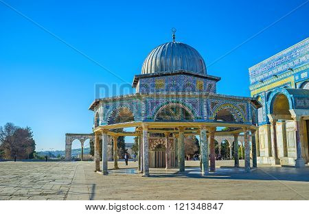JERUSALEM ISRAEL - FEBRUARY 16 2016: The Dome of the Chain with its beautiful stone pillars mihrab with the colorful stone pattern and islamic ornamentations of the glazed tiles on February 16 in Jerusalem.